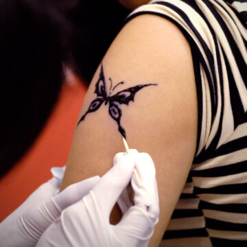 Butterfly tattoo design in White Iris Salon Clearwater